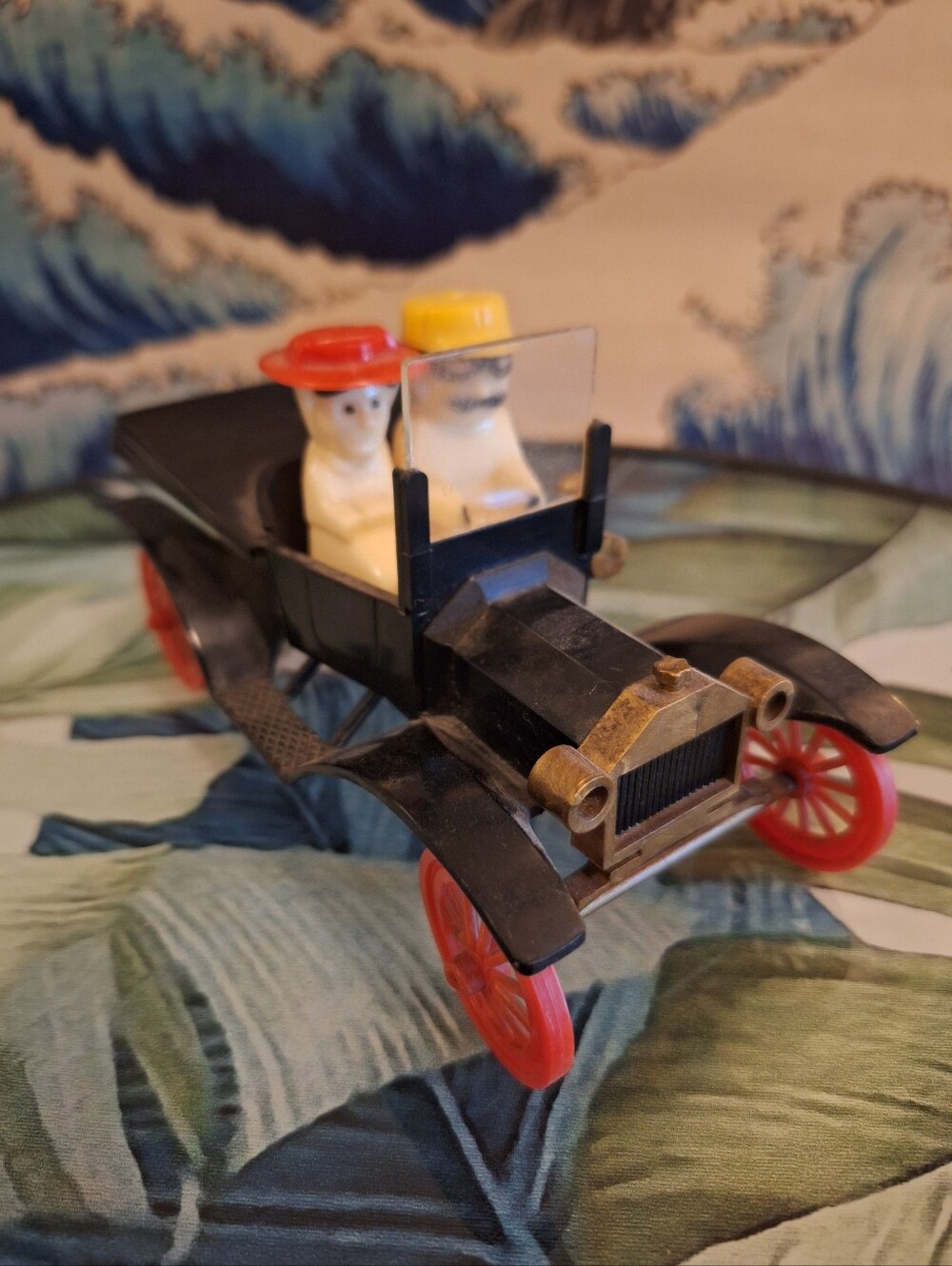 Classic Black Salt & Pepper Car with Red Wheels and Yellow/Red Driver Hats